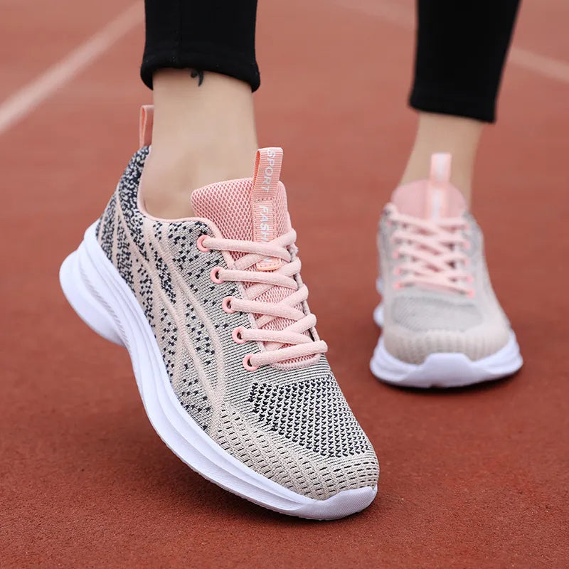 Textured knit performance runners in Pale Blush with pink laces and white soles.