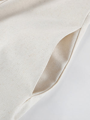 Button front tube maxi dress in beige cotton blend with a side pocket detail.