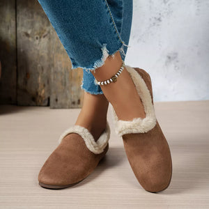 slippers in brown featuring round toe and flat fit