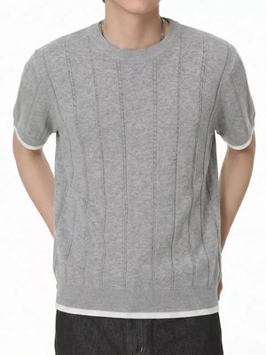 Grey knit t-shirt with crew neck, short sleeves, and contrast white accents on cuffs and hem.