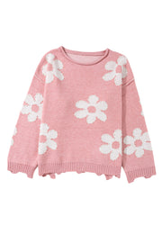 Blush pink knit sweater with white floral appliques and pearl details.