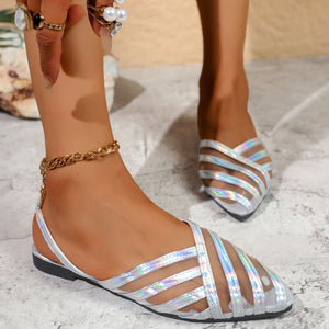Chic mesh pointed slingback flats in silver with crisscross straps and a pointed toe.