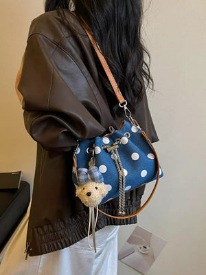 crossbody bag in white with polka dot and adjustable strap