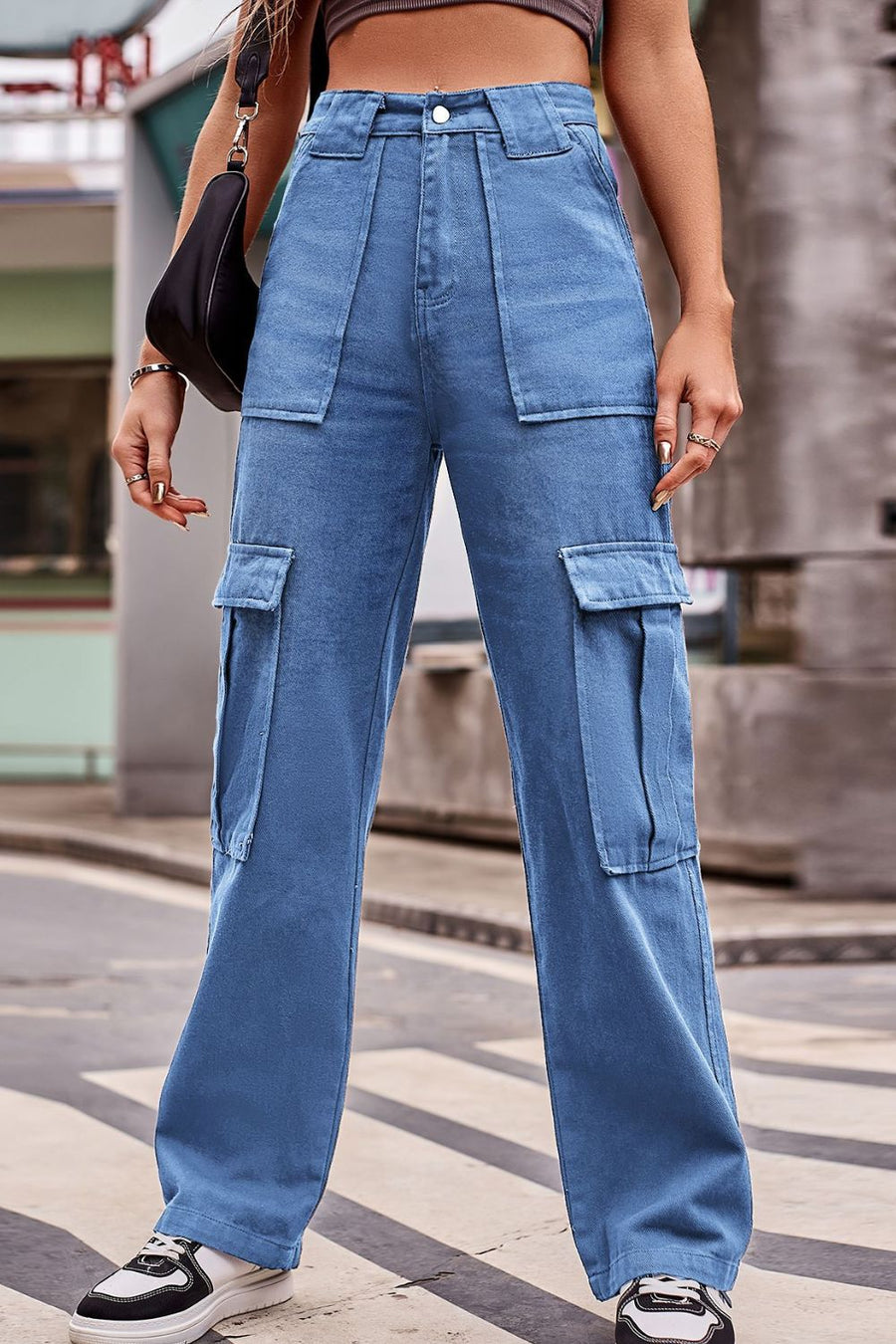 Utility pocket wide leg trousers in Dusty Blue denim with multiple cargo pockets.