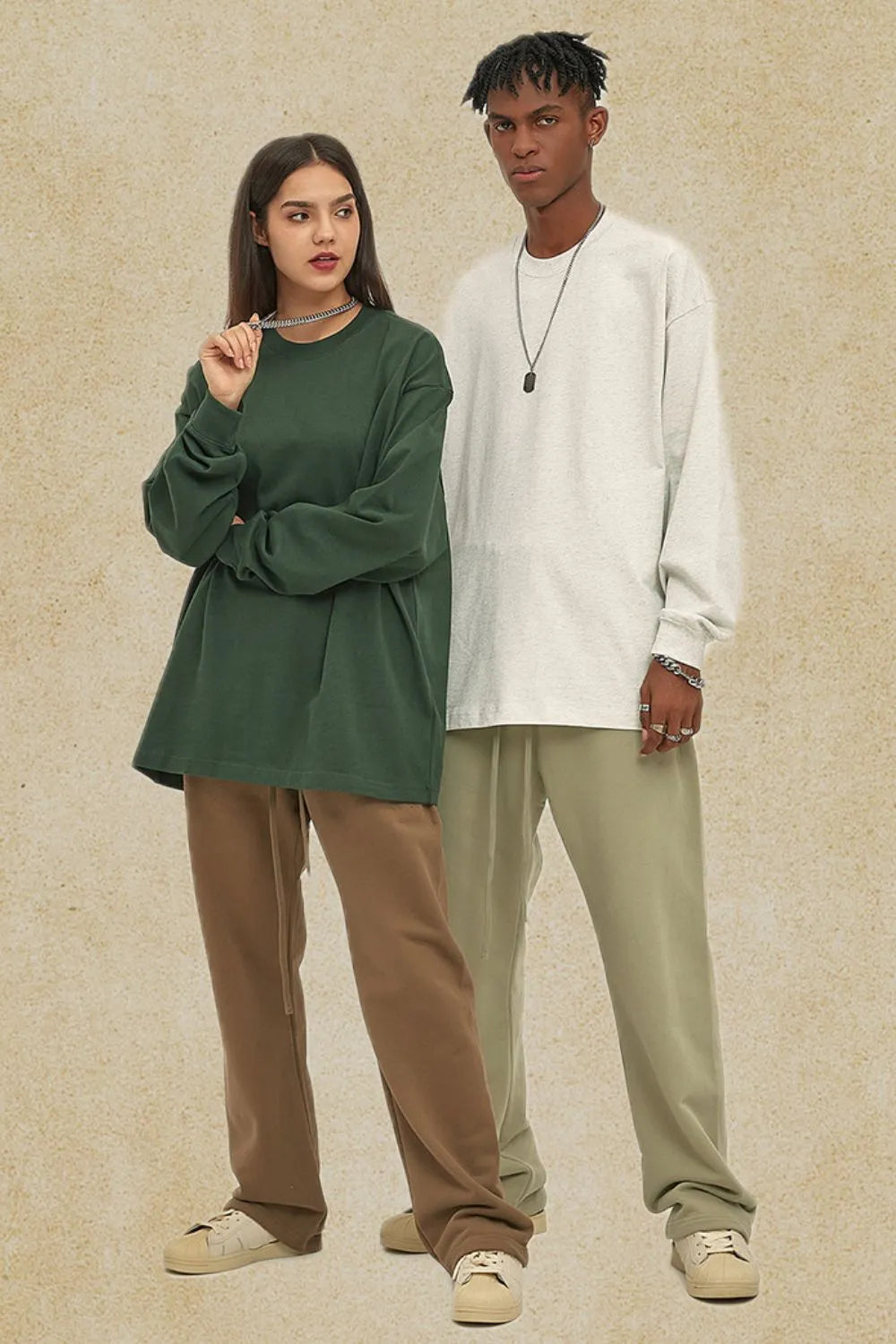 Oversized drop-shoulder crewneck pullover in Sage green and light gray, 100% cotton, basic style.