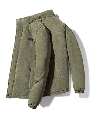 Men's padded corduroy puffer jacket in army green with zip pocket detail.