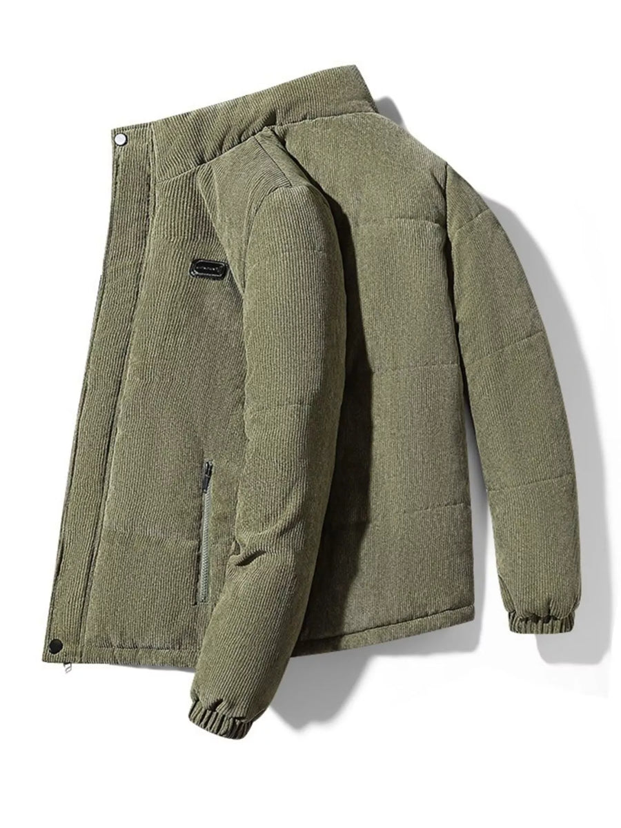 Men's padded corduroy puffer jacket in army green with zip pocket detail.