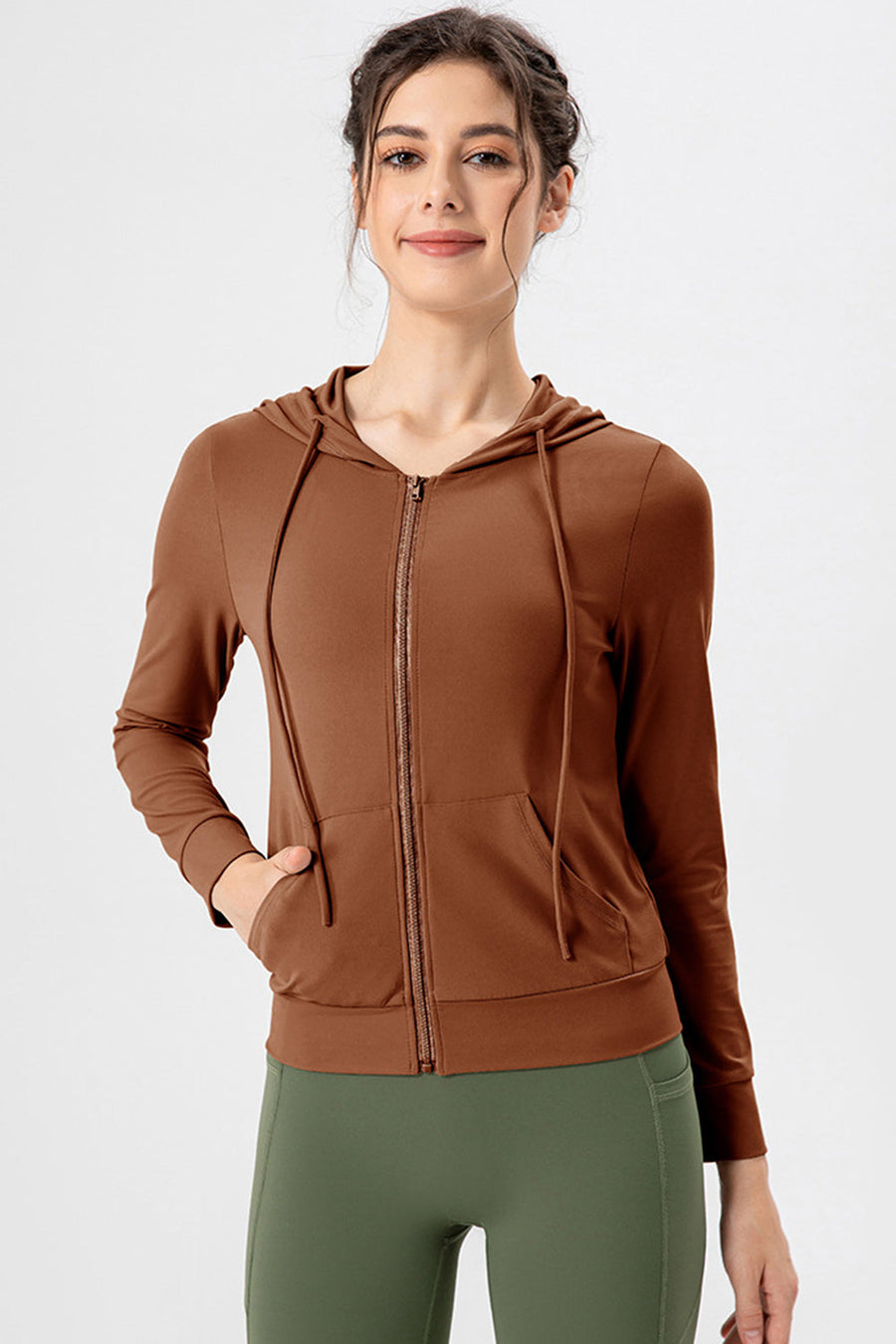 Brown zip-up hoodie with drawstrings and pockets, performance fit