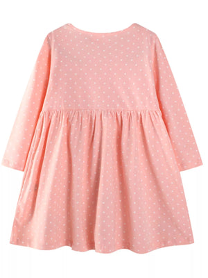 Watermelon pink polka dot cotton dress with embroidered animal detail and gathered skirt.