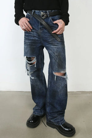 Dark wash distressed cotton jeans with ripped knees and a relaxed fit.
