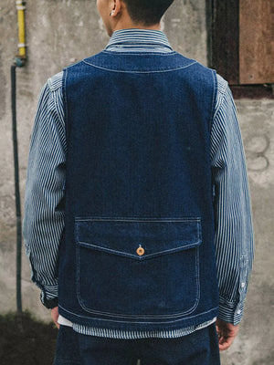 Plus-size navy denim vest with V-neck and single button-flap pocket.