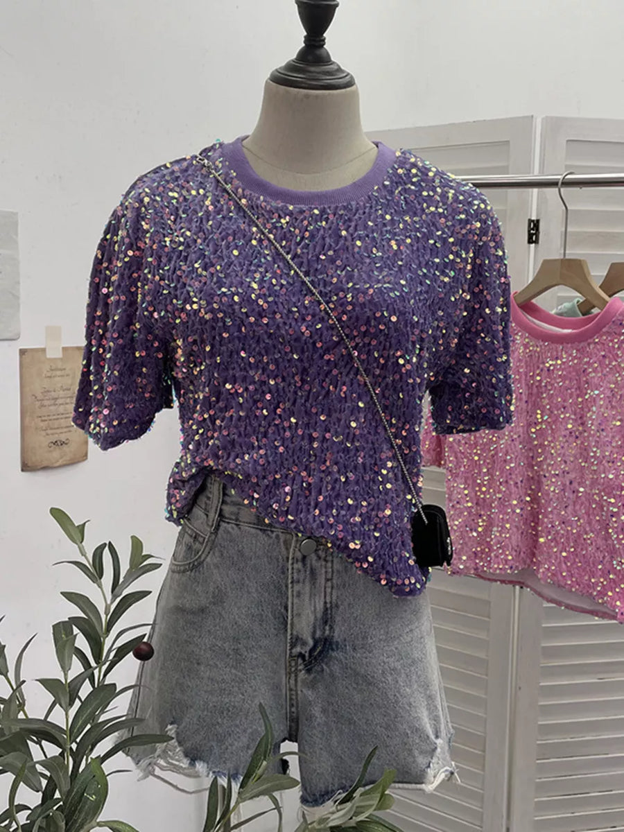 Purple crew neck t-shirt with iridescent sequins and short sleeves.