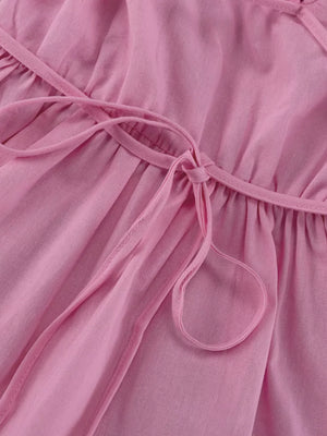 Pink linen blend dress with tie waist and spaghetti straps
