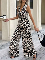 Chic sleeveless leopard print romper with V-neck and wide legs.