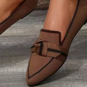 Brown knit loafers with contrast trim and bow detail.