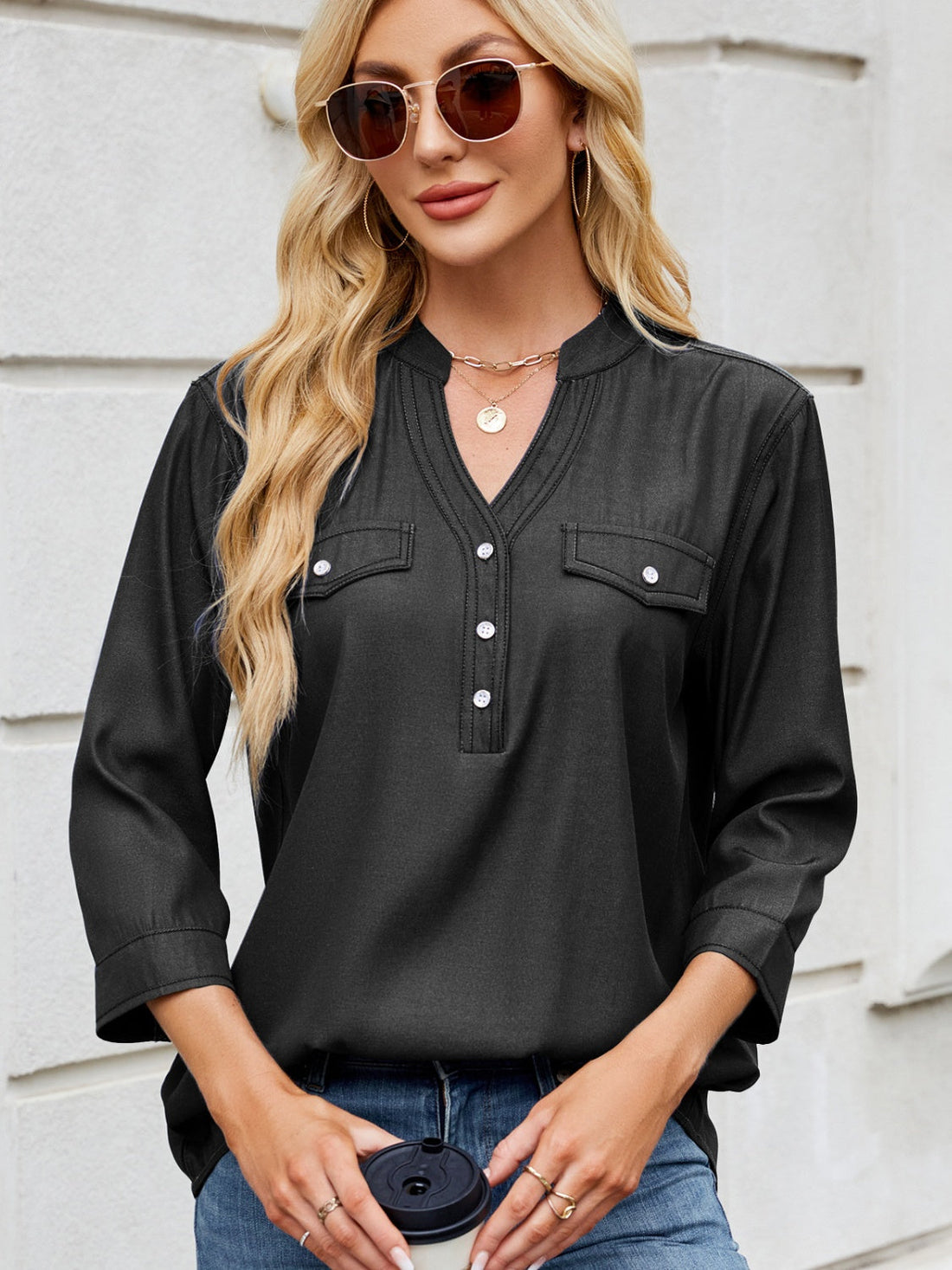 Black denim henley blouse with utility pockets and button front
