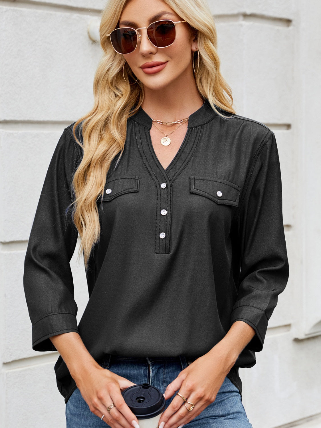 Black denim henley blouse with utility pockets and button front