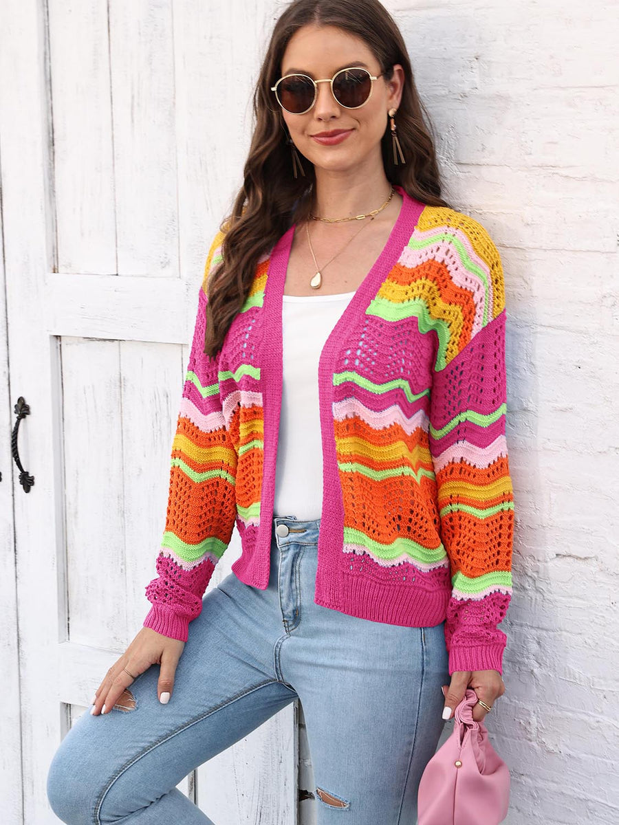 Rainbow wave crochet cardigan with open front and colorful chevron stripes.