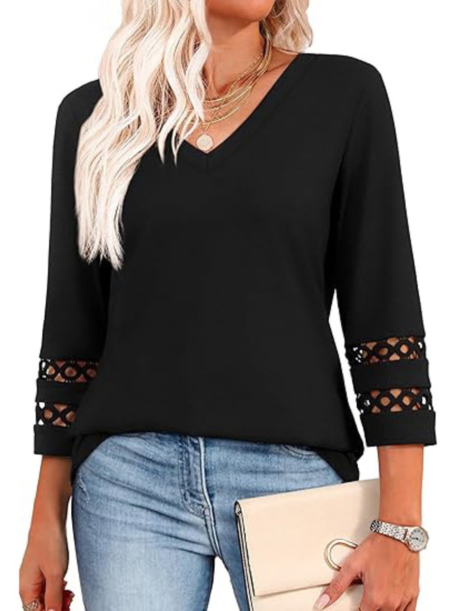 Black V-neck t-shirt with 3/4 sleeves featuring cutout detail at the cuffs.