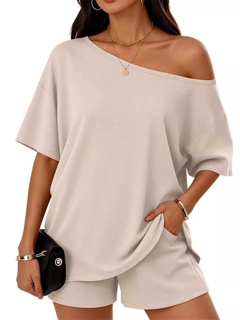two-piece set in Black with one-shoulder and short sleeve