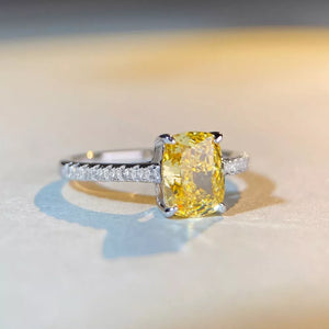 silver ring featuring center stone and geometric
