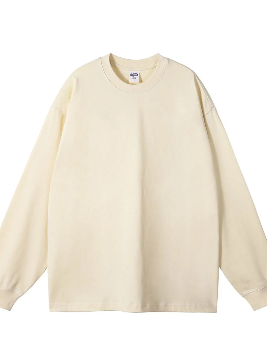 Oversized crewneck pullover in beige, 100% cotton, with drop shoulders and long sleeves.