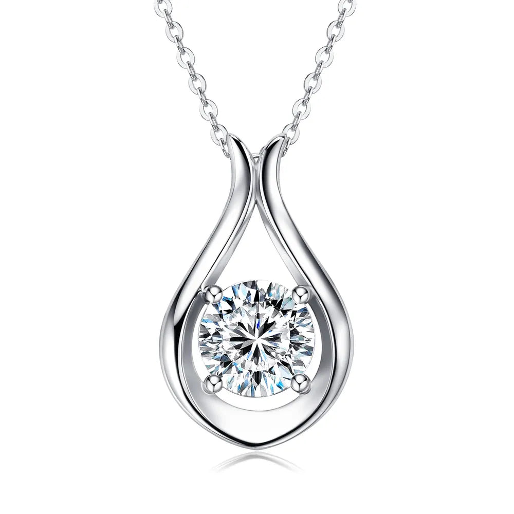 Silver teardrop pendant necklace with round moissanite stone