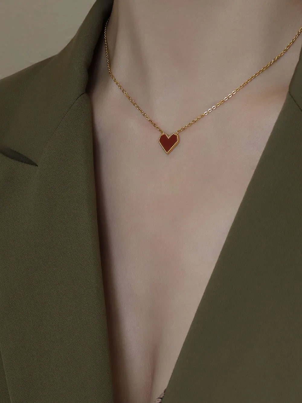 Gold necklace with a crimson heart pendant, 18K gold chain