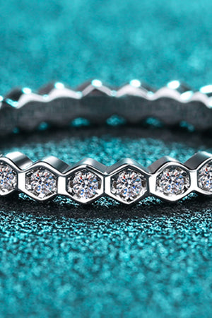 Silver eternity ring with hexagonal settings and clear stones