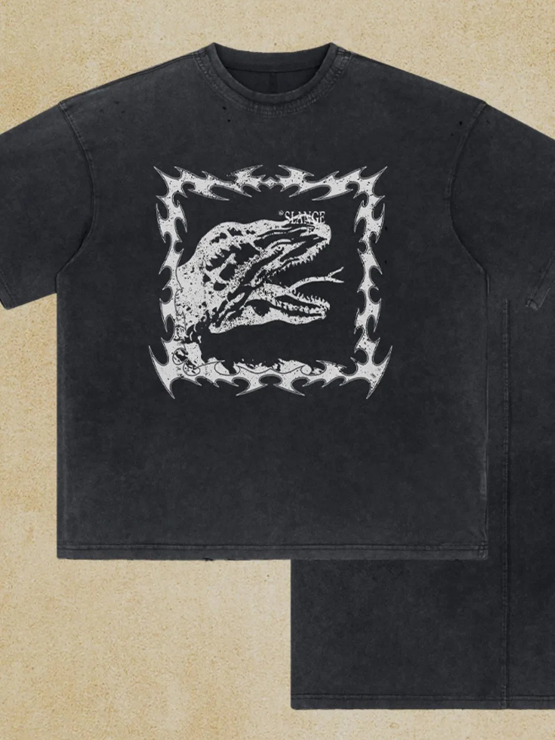 Black distressed graphic tee with dinosaur motif and distressed details.