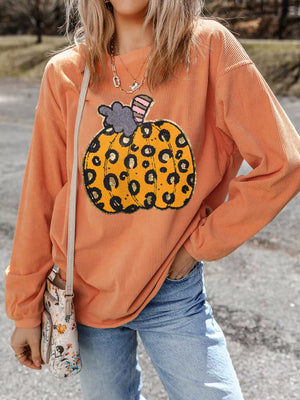 orange sweatshirt with leopard and crew neck