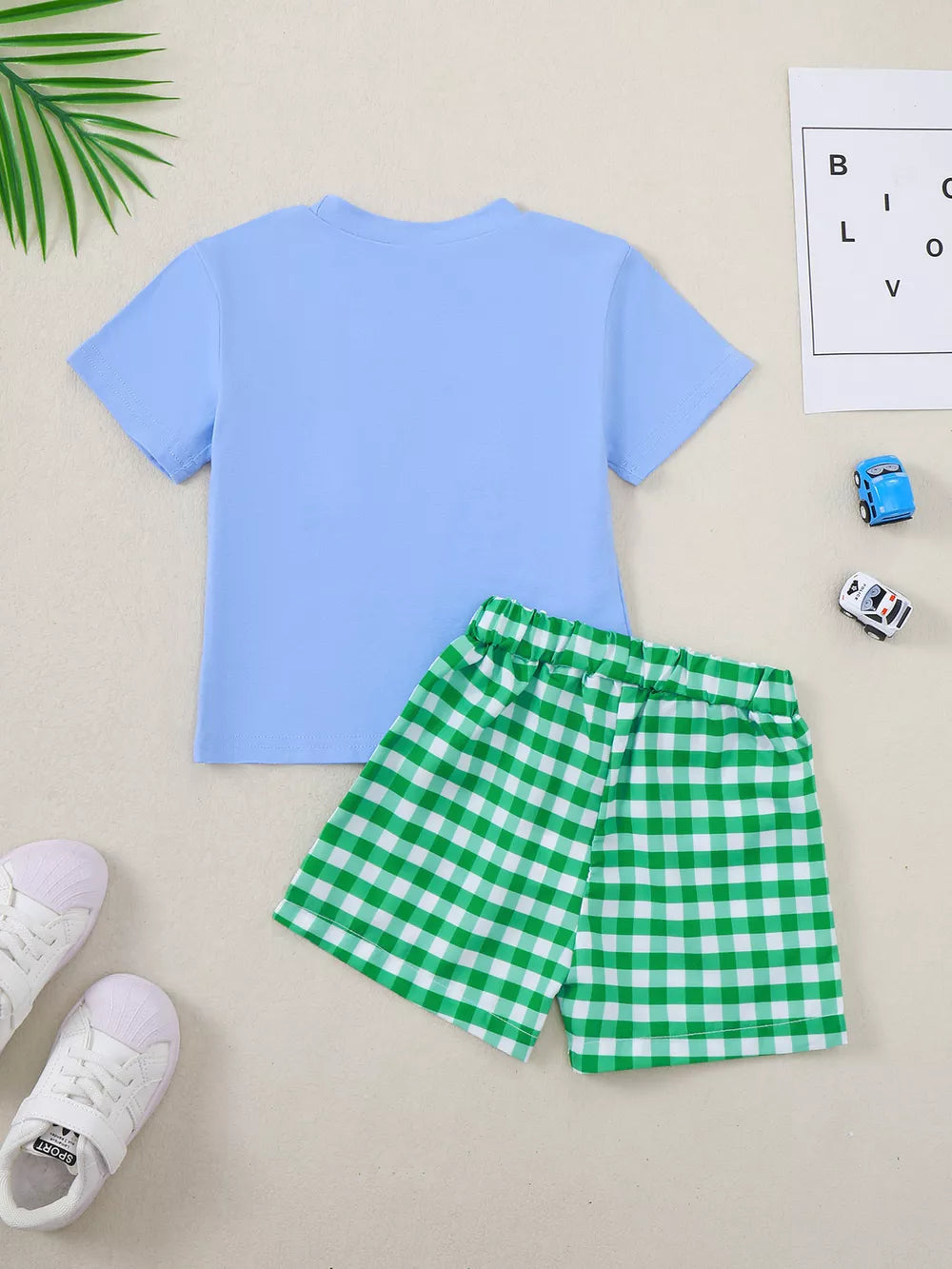 Baby cotton set with light blue t-shirt and green gingham shorts