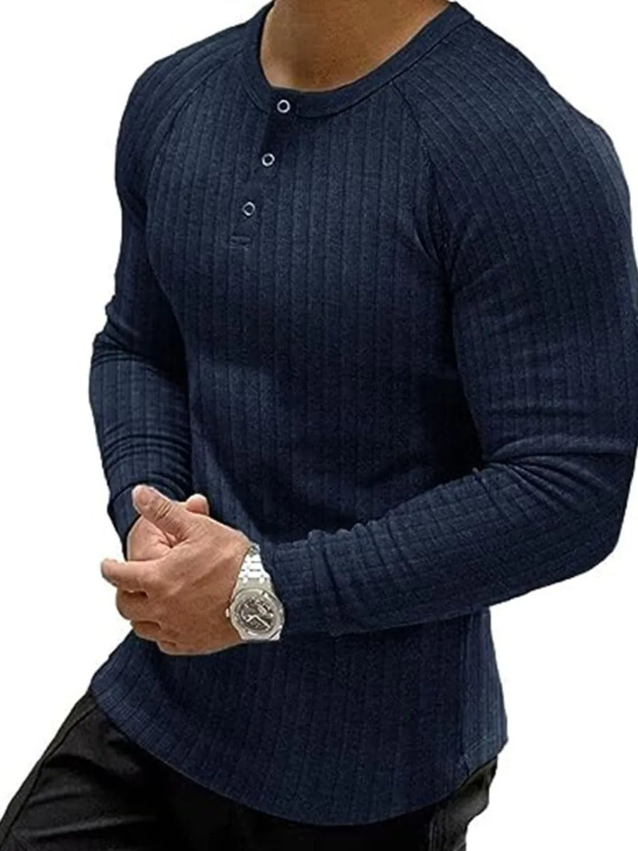Navy ribbed henley tee with raglan sleeves and button detail.