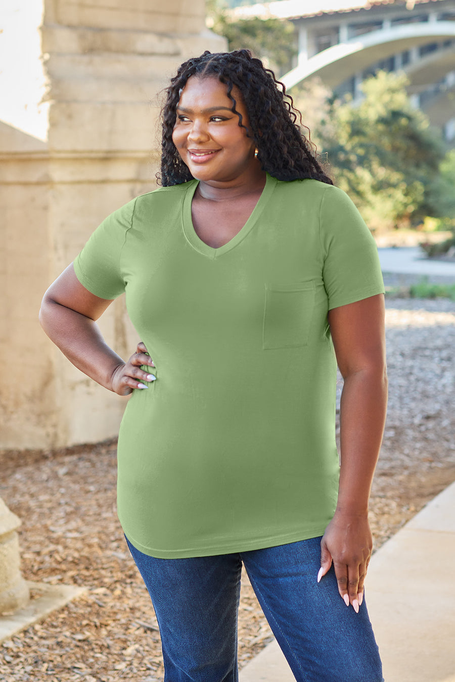 Matcha green V-neck t-shirt with short sleeves and a chest pocket.
