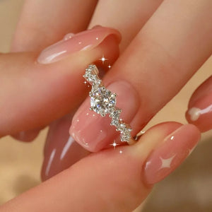 925 sterling silver,Moissanite Carat weight: 2ct Care instructions: Avoid wearin ring in Silver with straight silhouette