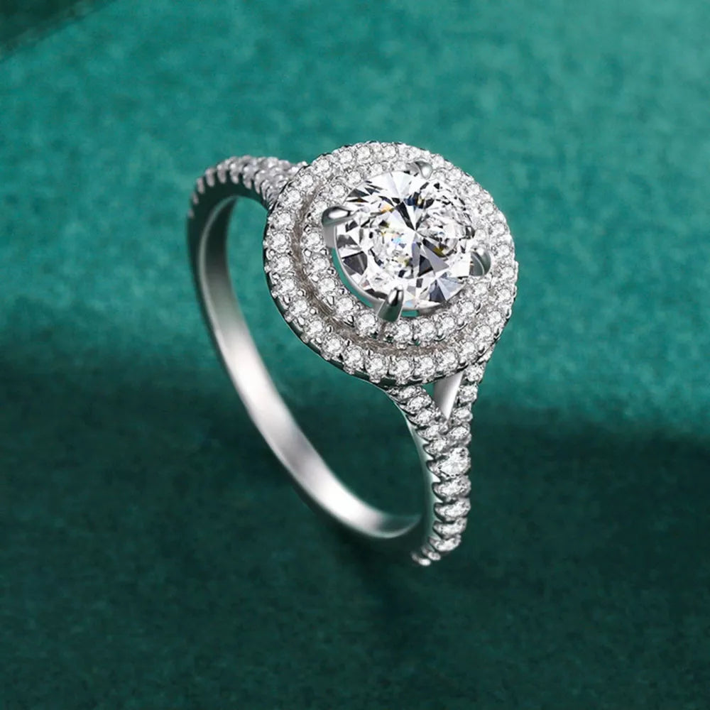 ring in silver featuring halo setting and round halo fit