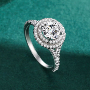 ring in silver featuring halo setting and round halo fit