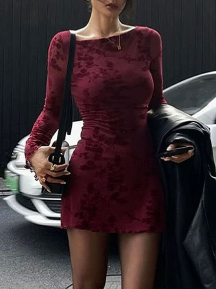 Burgundy floral mesh bodycon mini dress with long sleeves and a boat neck.