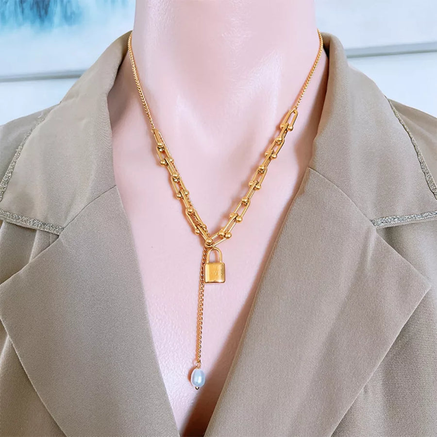 Synthetic Pearl,18K Gold-Plated,Titanium Steel Care instructions: Avoid wearing necklace in Gold with draped silhouette