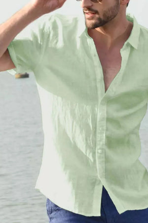 Light green linen resort shirt, relaxed fit, short sleeves, open collar, button front.