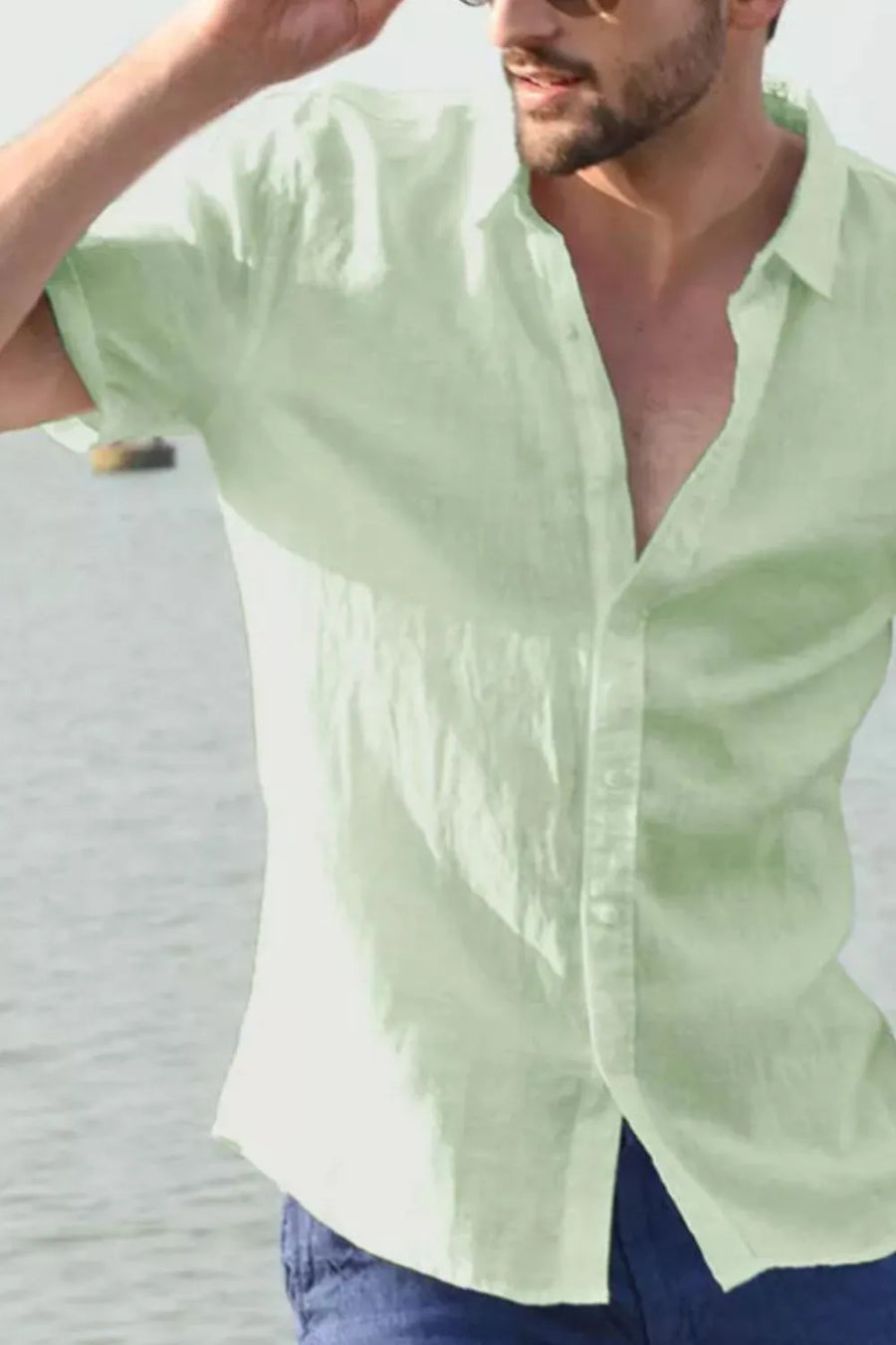 Light green linen resort shirt, relaxed fit, short sleeves, open collar, button front.