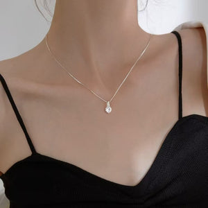 925 sterling silver,Moissanite Carat weight: 1ct Care instructions: Avoid wearin necklace in Silver with delicate silhouette