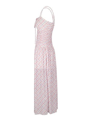 Ruched tied maxi dress in pink plaid polyester with spaghetti straps and a-line cut.