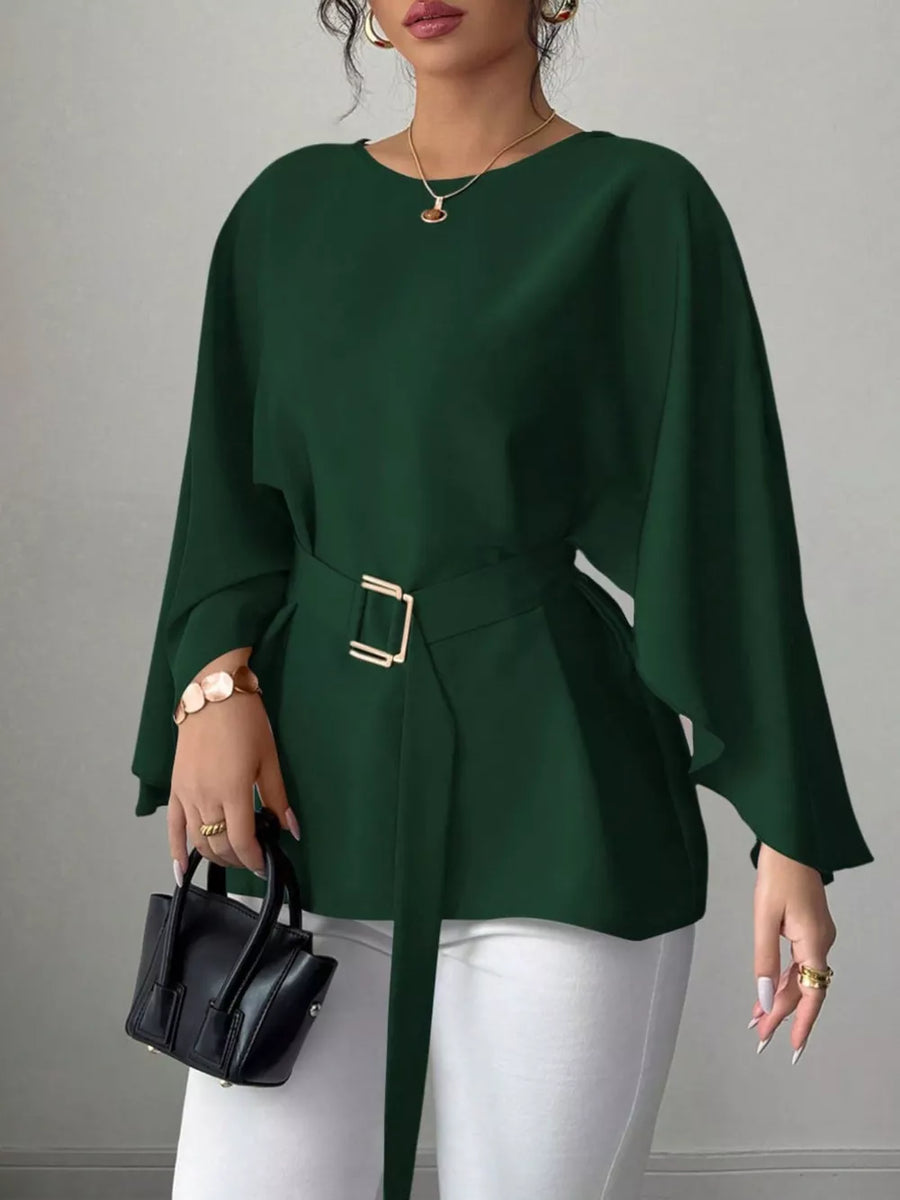 Belted batwing sleeve blouse in olive green with gold buckle detail.