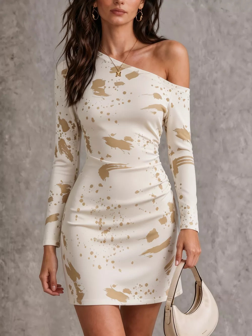 cream bodycon dress with paint splatter and one-shoulder