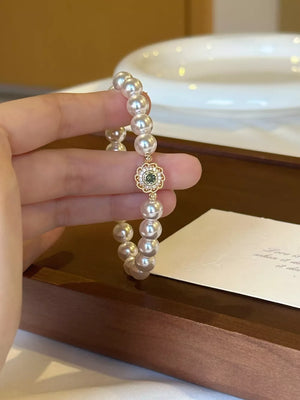 ivory bracelet with floral charm and not applicable