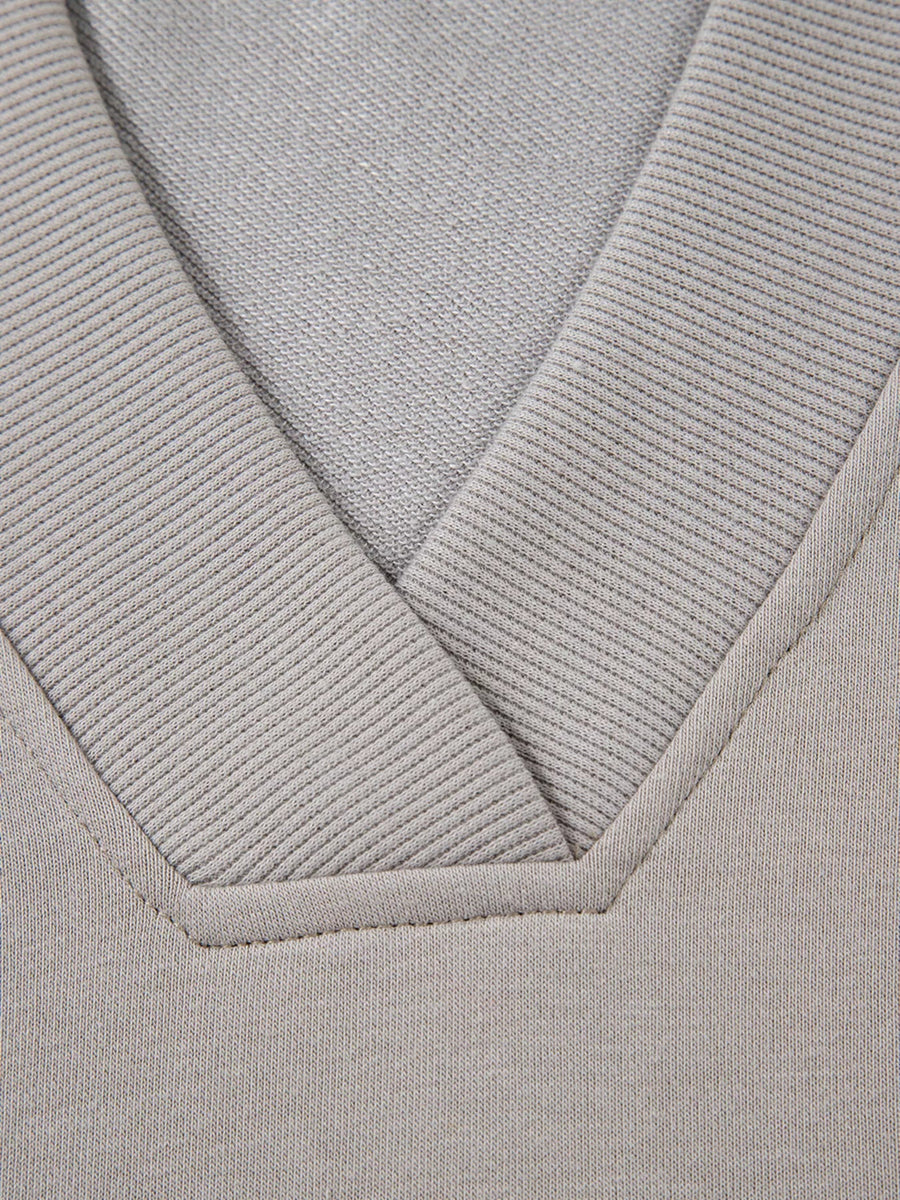Gray V-neck sweatshirt with ribbed trim detail