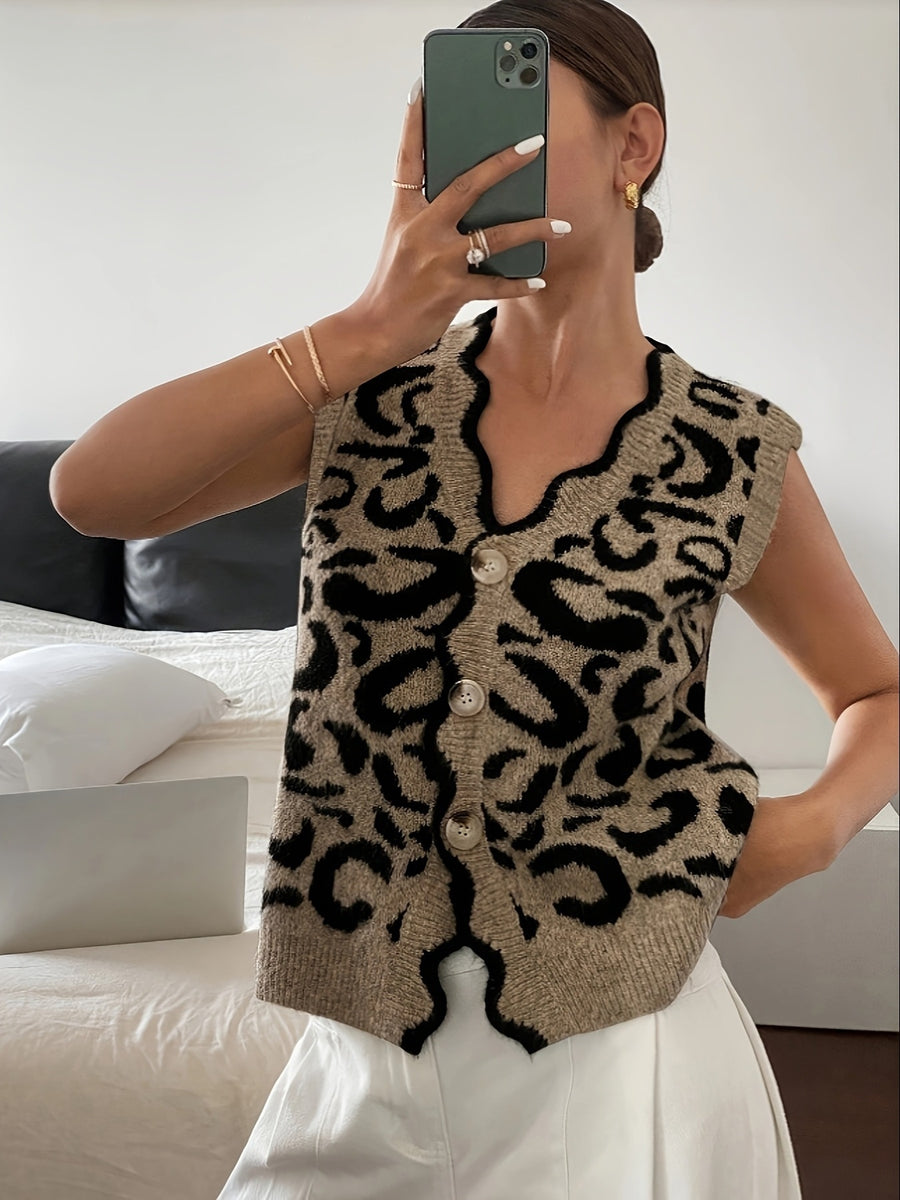 tan sweater vest with hip-length and button-front
