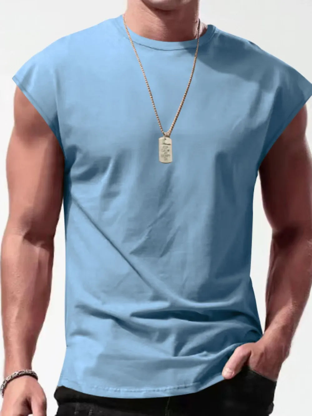 Light blue muscle-fit sleeveless tee with wide shoulders and a crew neck.