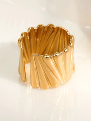 ring in gold with geometric and wide band